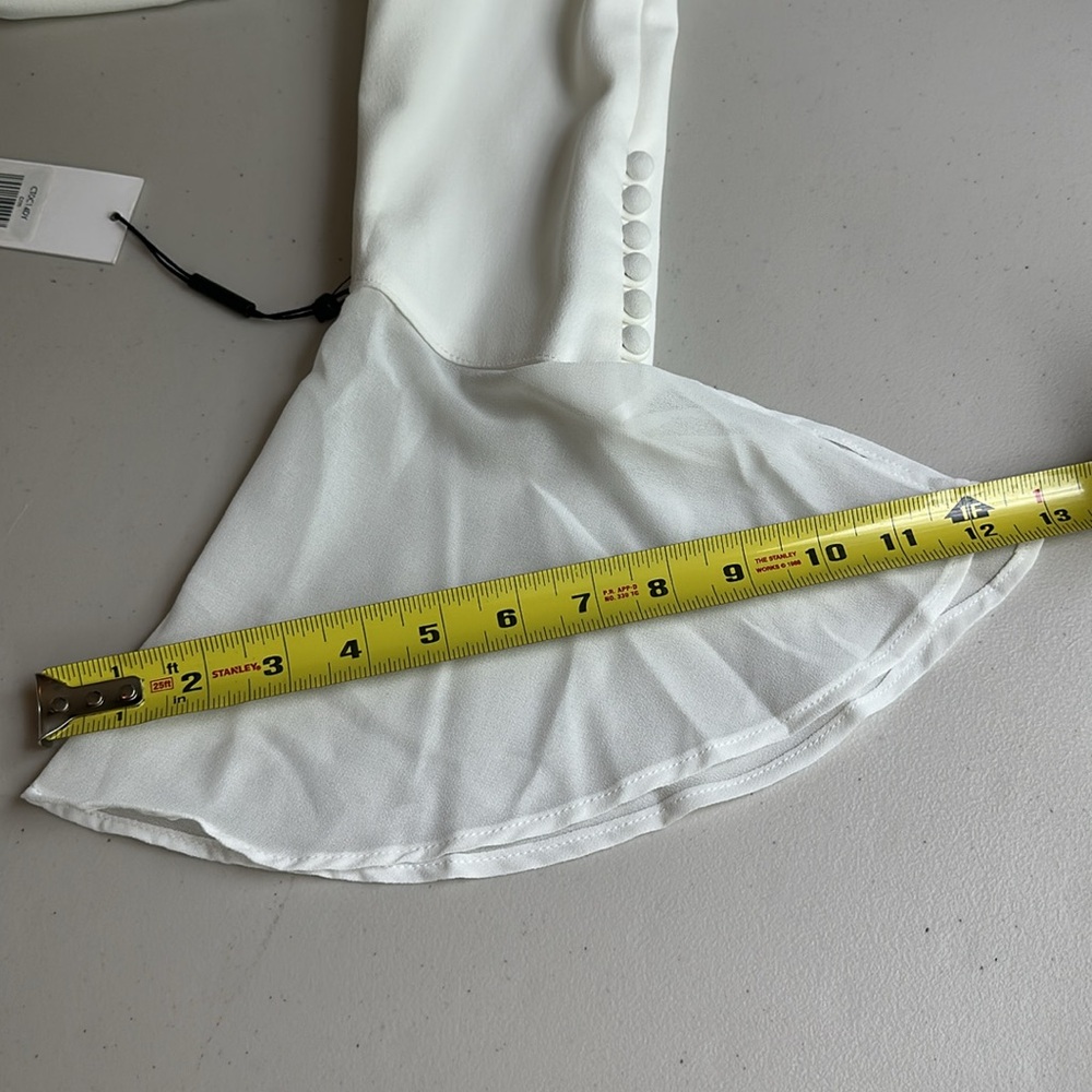 Elegant Calvin Klein White Dress with Flared Sleeves. - Picture 11 of 15